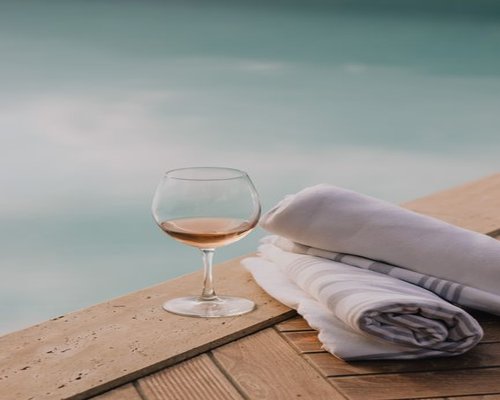 glass of water and towel in a spa like setting